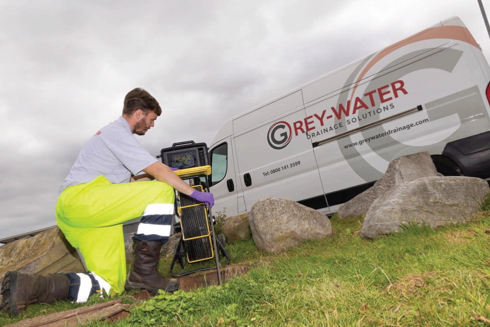 Chris uses a CCTV camera to inspect inside a manhole in Gravesend.