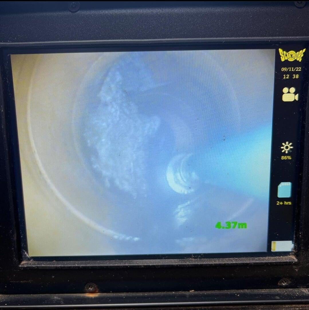 CCTV drain survey carried out and viewed on screen.