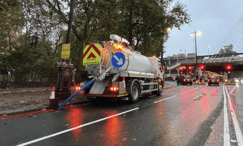 The Whale in operation by Grey-Water Drainage at the side of the road.