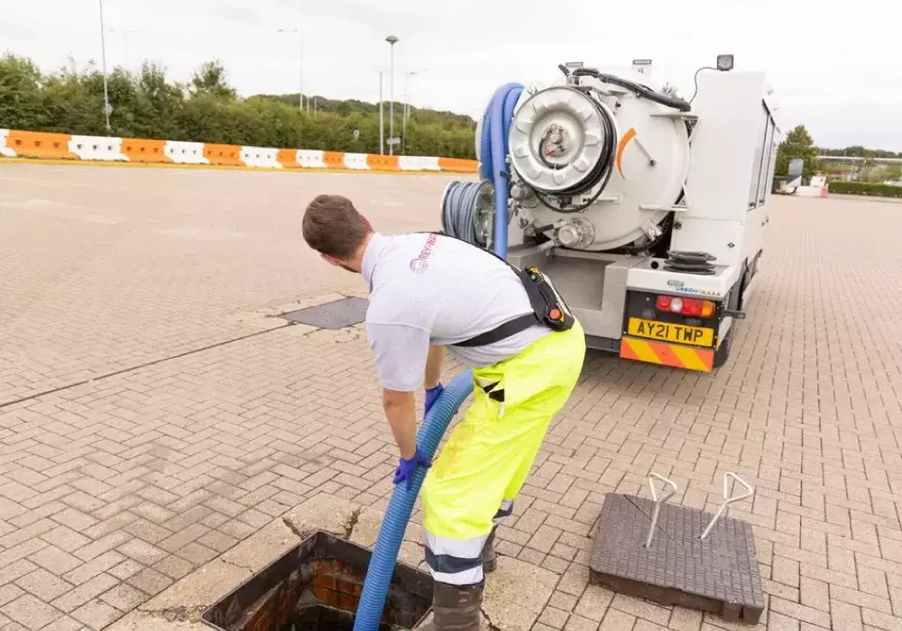 Grey-Water drain operative using a pump vehicle for a manhole on a commercial premises.